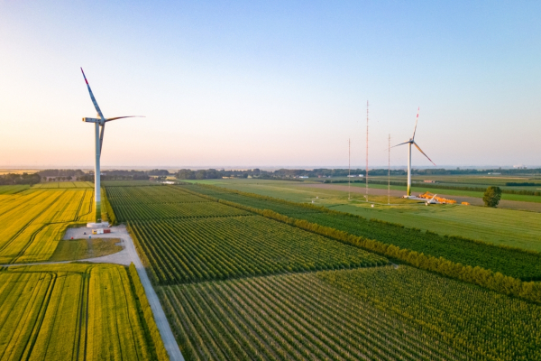 View of the two research turbines and the mast array at the research wind farm WiValdi.